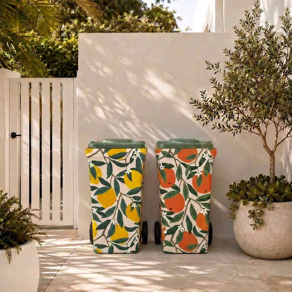 Lemon Squeeze and Valencia wheelie bin covers side by side in a modern Australian courtyard